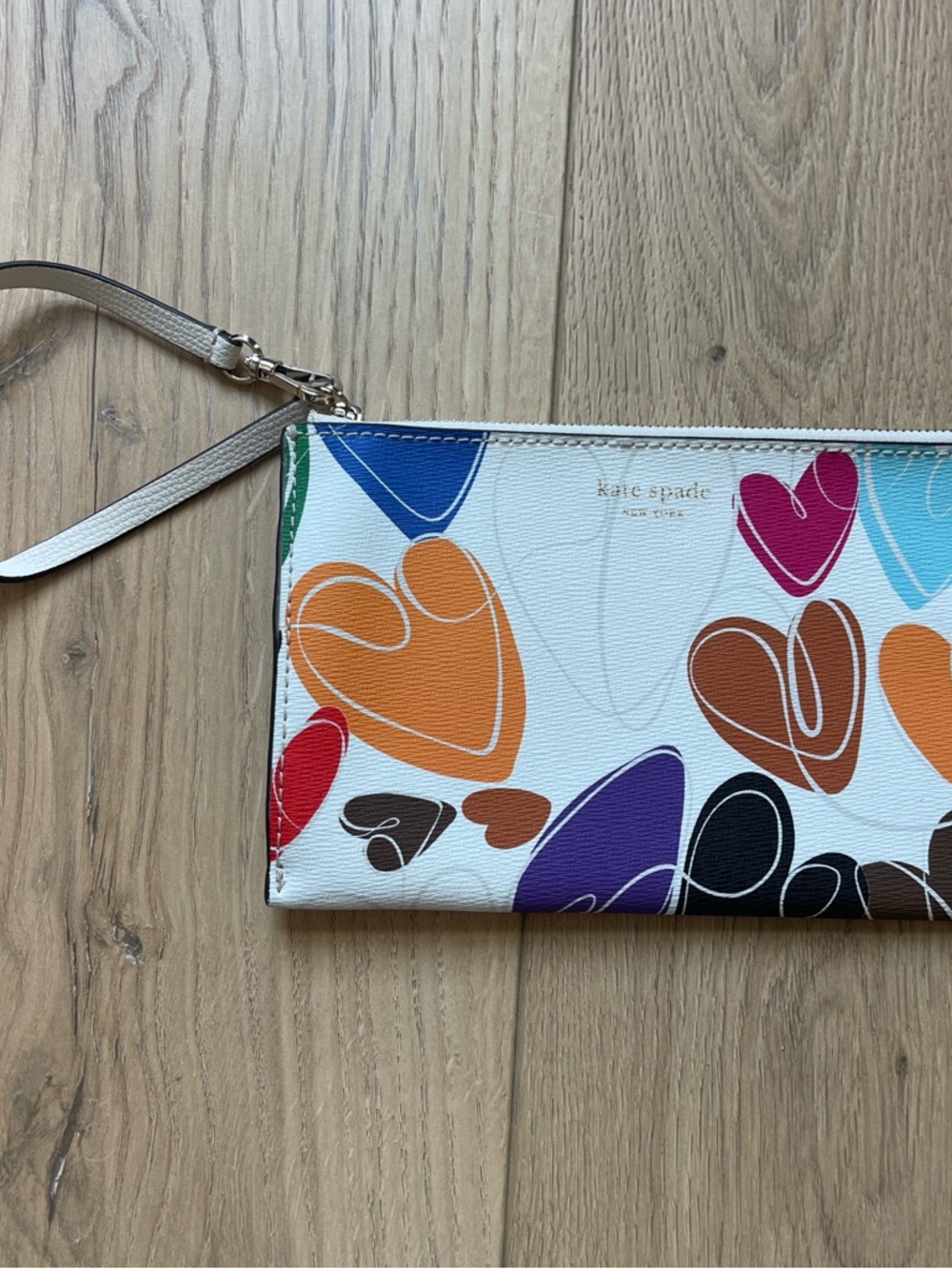 kate spade White Multicolor Heart Print Wristlet with Tan Strap